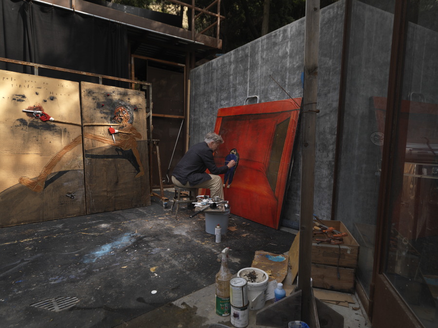 David Lynch painting in his studio